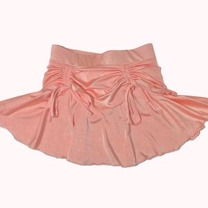 Light pink mini skirt with ruffles and ruching